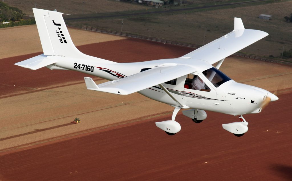 The Jabiru J230-D soars over crop paddocks in the Bundaberg region. The Jabiru J230-D soars over crop paddocks in the Bundaberg region.